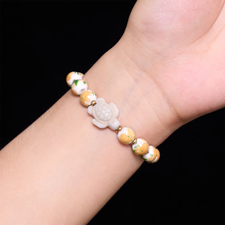 Buddha Stones Bransoletka Wealth z naturalnym, białym turkusem i wzorem żółwia - image 4