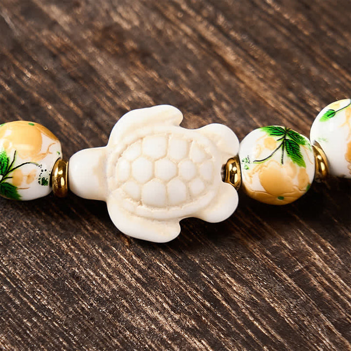 Buddha Stones Bransoletka Wealth z naturalnym, białym turkusem i wzorem żółwia - image 10