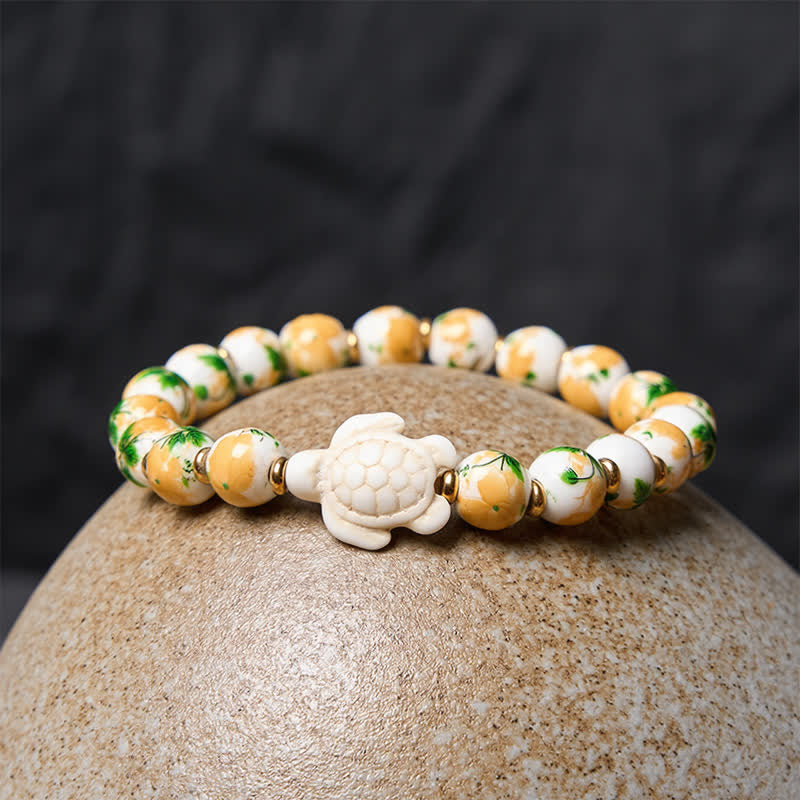 Buddha Stones Bransoletka Wealth z naturalnym, białym turkusem i wzorem żółwia - image 3