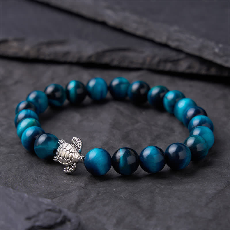 Buddha Stones Bransoletka z niebieskim tygrysim okiem i miedzianym żółwiem - image 10