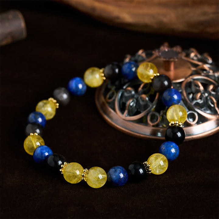 Buddha Stones Bransoletka Serenity z koralików obsydianu cytrynu i lapis lazuli w srebrnym połysku - image 1