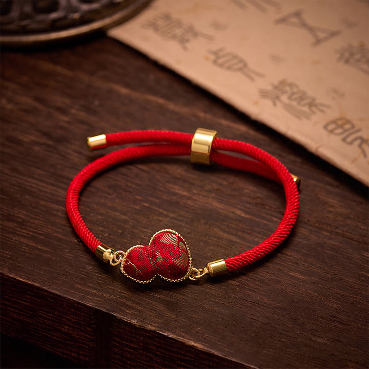 Buddha Stones Bransoletka ochronna z brokatowej tykwy Red String Song - Brokat Song (ten sam odcień koloru – wzór różny) - image 0