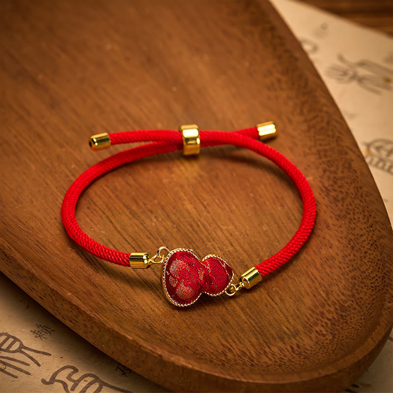 Buddha Stones Bransoletka ochronna z brokatowej tykwy Red String Song - image 1