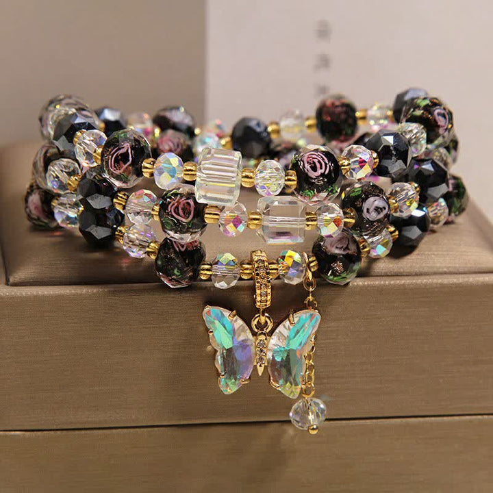 Buddha Stones Bransoletka z potrójnym owinięciem i zawieszką z koralików szklanych Liuli w kolorze czarnym z motywem motyla i róży - Motyl (Transformacja ♥ Miłość) - image 0