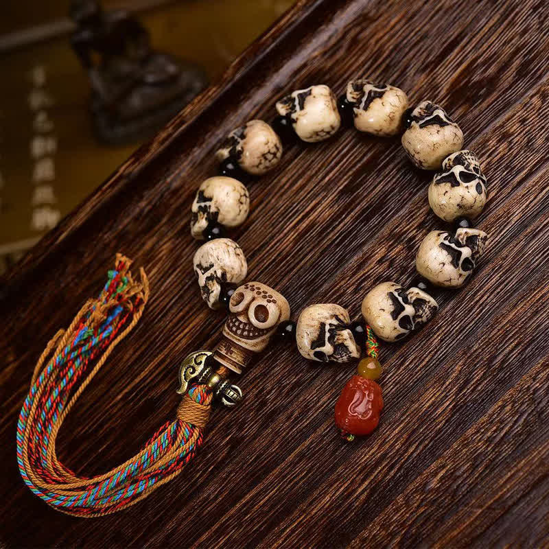 Buddha Stones Tybetańska ręcznie rzeźbiona bransoletka ochronna z koralików z kości z motywem Władcy Zwłok - 22 × 14 × 13 mm - image 0