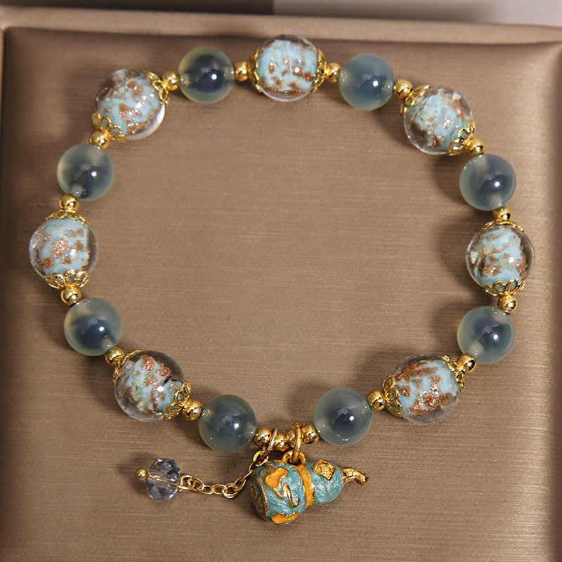 Buddha Stones Bransoletka z niebieskim agatem cukierkowym Liuli Glass Gourd z zawieszką Joy - image 1