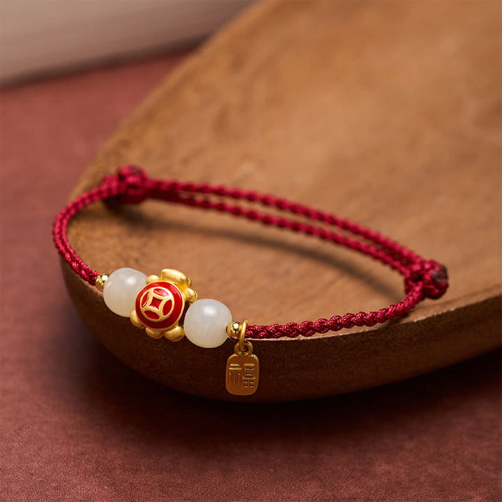 Buddha Stones Bransoletka wzmacniająca Turtle Red String, tkana ręcznie - image 1