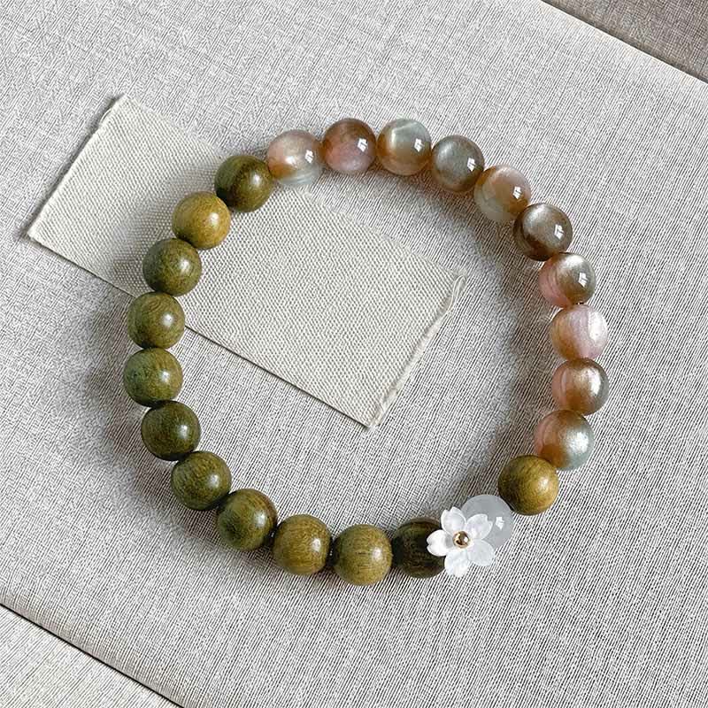 Buddha Stones Bransoletka Serenity z zawieszką w kształcie kwiatu kociego oka z zielonego drzewa sandałowego - 8mm różowe koraliki - image 0