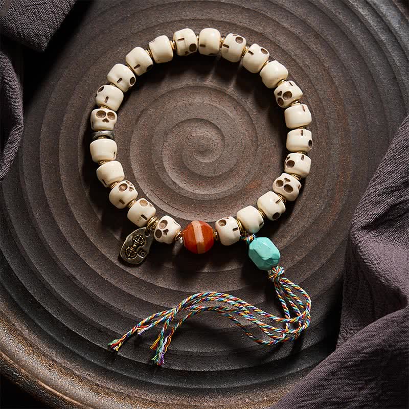 Buddha Stones Tybetańskie koraliki z kości, bransoletka uziemiająca z motywem czaszki Władcy Zwłok - image 1