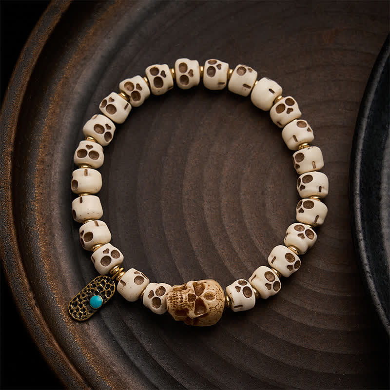 Buddha Stones Ręcznie rzeźbione koraliki z kości, wzór czaszki Władcy Trupów, bransoletka tybetańska Siła i Zmiana - 9×6,3 mm - image 0