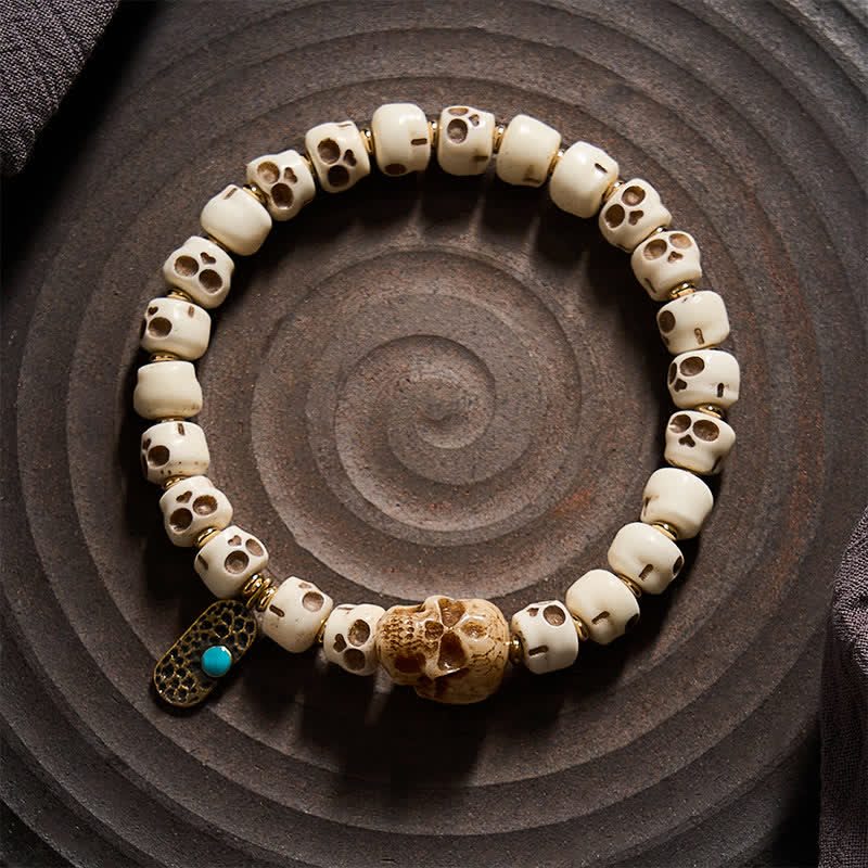 Buddha Stones Ręcznie rzeźbione koraliki z kości, wzór czaszki Władcy Trupów, bransoletka tybetańska Siła i Zmiana - image 1