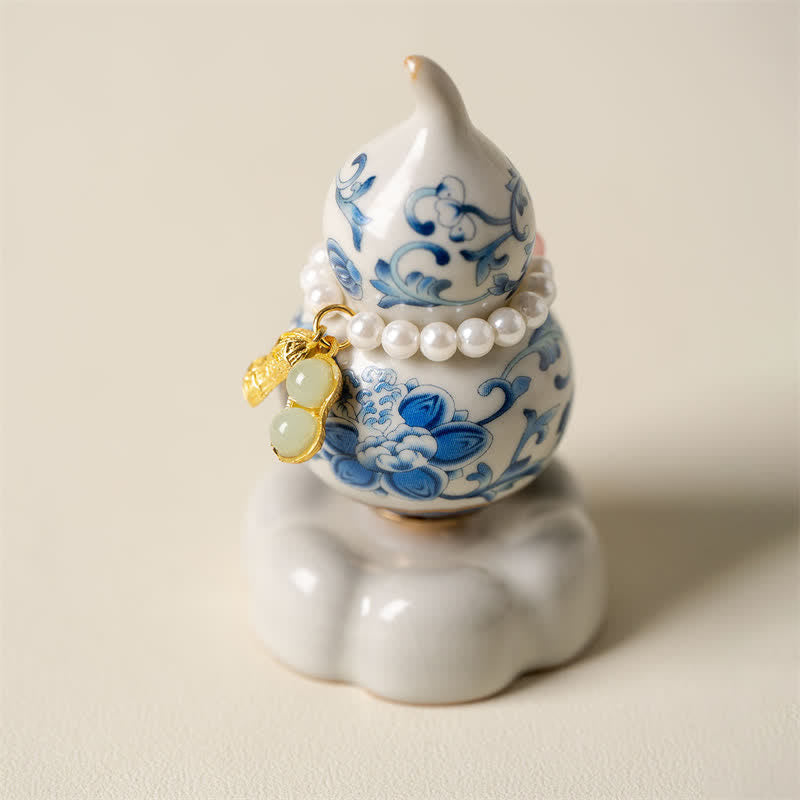Buddha Stones Niebiesko-biała ceramiczna obrotowa tykwa Lotus Mindful Living Decor - Biała podstawa ok. 4,8 cm × 4,8 cm × 8,5 cm - image 0