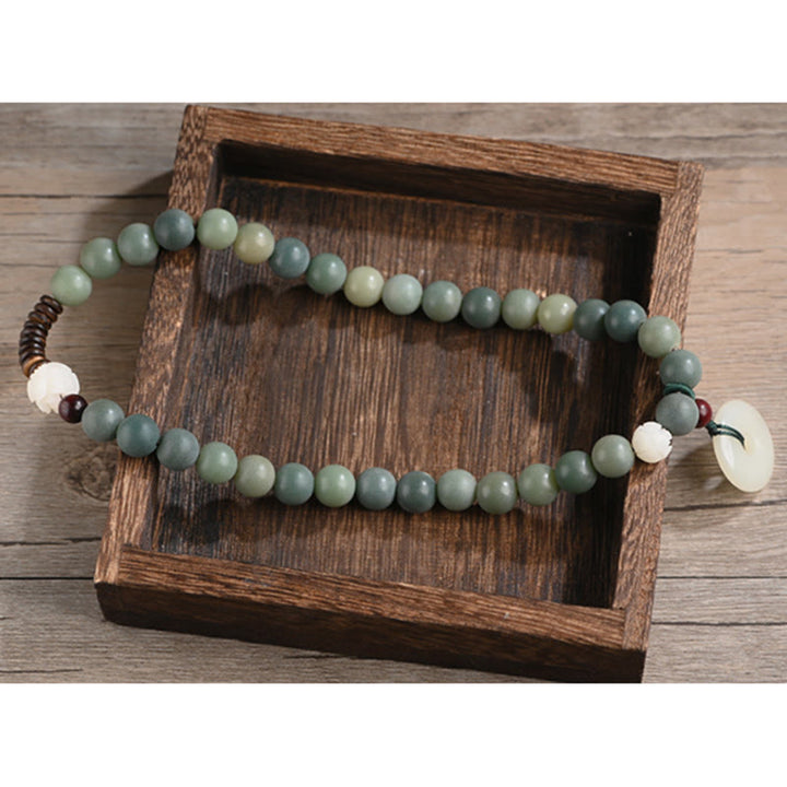 Bransoletka Buddha Stones Cyan Bodhi Nasiona Lotosu Jadeit Spokój Klamra Mądrość Podwójne Owijanie