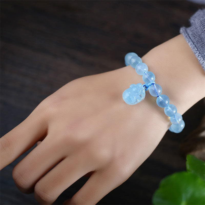 Bransoletka z naturalnego bursztynu i akwamarynu PiXiu Peace Healing Charm