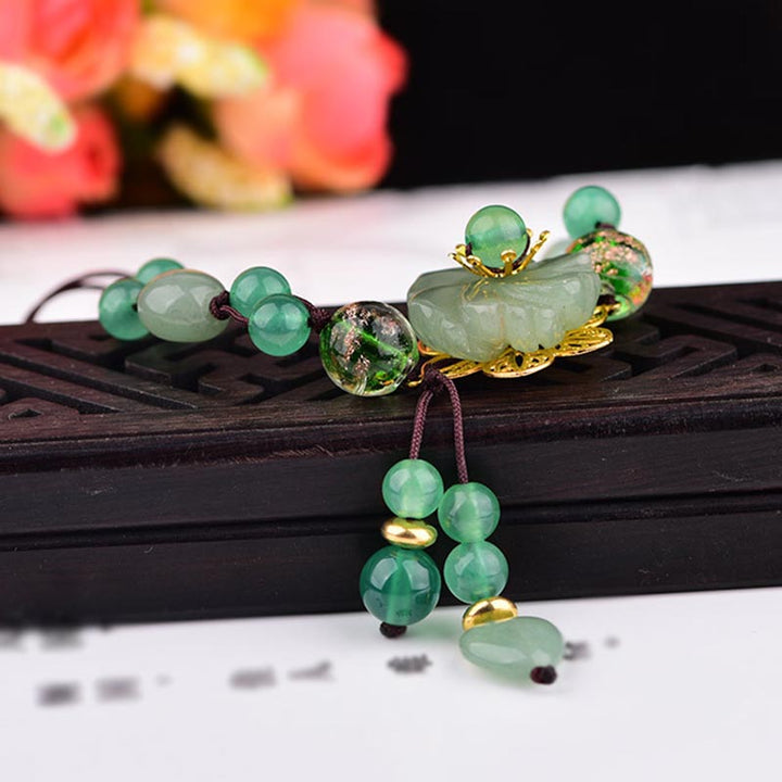 Bransoletka z naturalnego zielonego jadeitu z kwiatami szczęścia i Buddha Stones