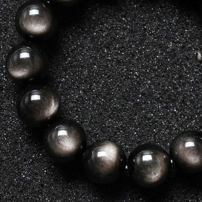 Bransoletka ochronna z naturalnego obsydianu i Buddha Stones w kolorze srebra