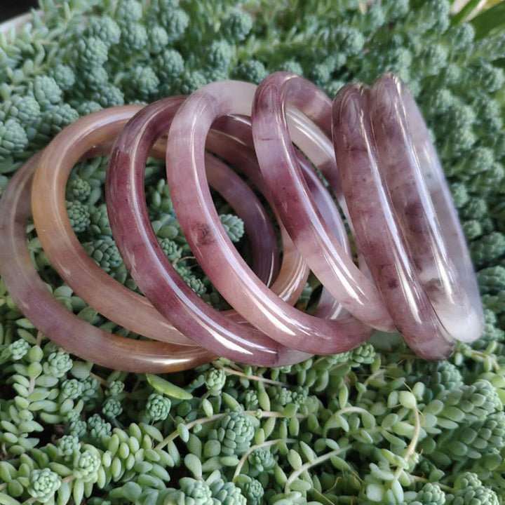 Bransoletka ochronna z fioletowym jadeitem i Buddha Stones