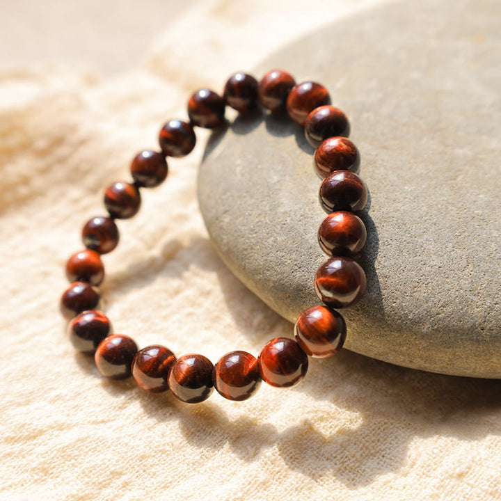 Bransoletka z naturalnych koralików leczniczych z Buddha Stones i tygrysim okiem