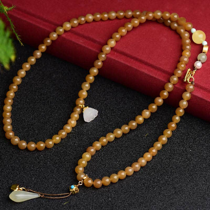 Naturalna bransoletka z perełkami Hetian Topaz Amber Lotus White Jade Success
