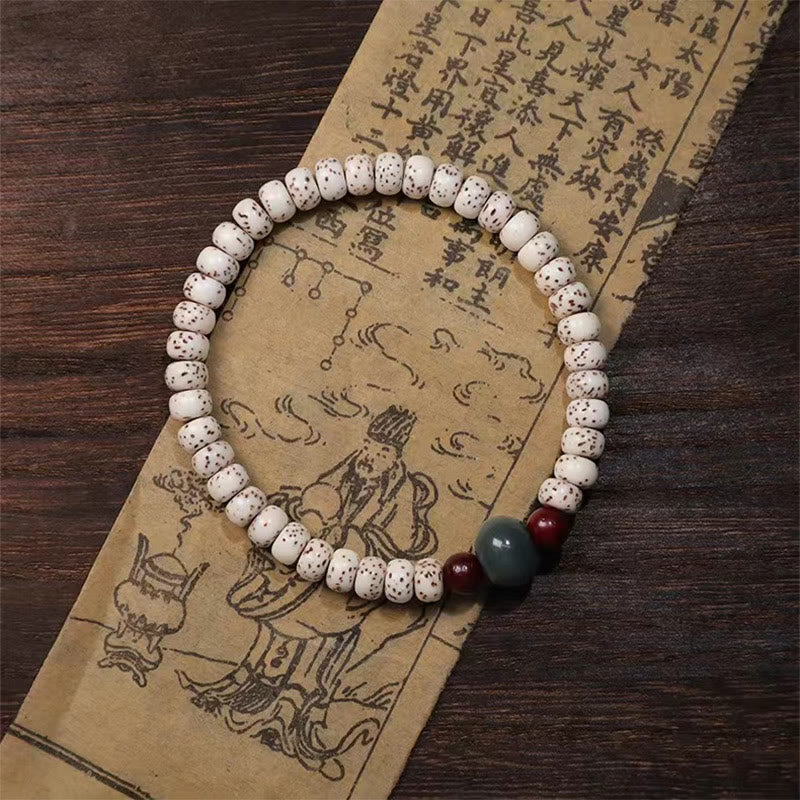 Bransoletka mądrości z małych liści drzewa sandałowego z nasion Bodhi w kolorze czerwonym z Buddha Stones