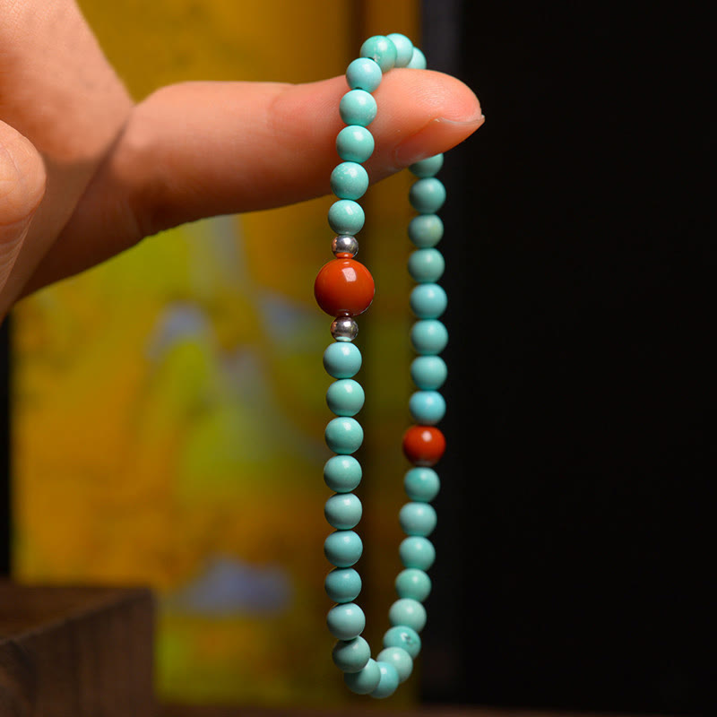 Bransoletka ochronna z koralików z czerwonego agatu i Buddha Stones - image 2