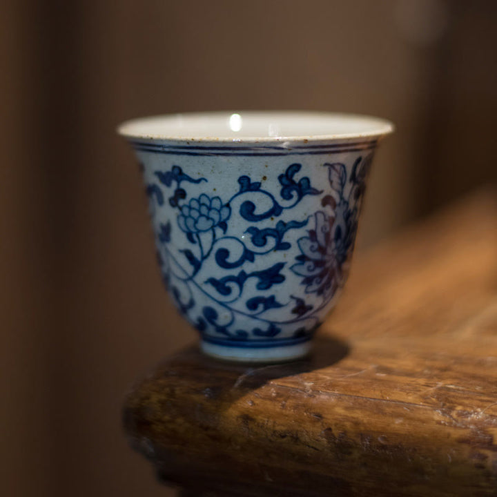 Buddha Stones Jingdezhen Niebiesko-biała porcelana Malowana ręcznie Lotos Kwiat Śliwki Ceramiczna filiżanka do herbaty Kung Fu Filiżanki do herbaty
