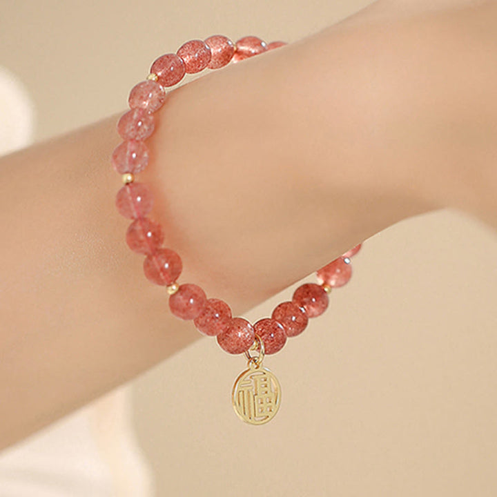 Bransoletka z Buddha Stones 14K pozłacana kwarcem truskawkowym Fu Character Healing Charm