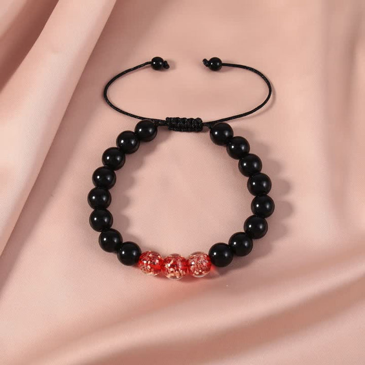 Bransoletka Buddha Stones Black Obsidian Luminous Glowstone Strength