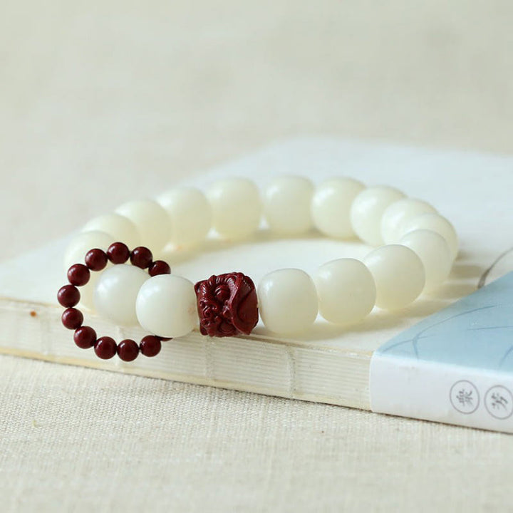 Buddha Stones Naturalne Nasiona Bodhi Cynober Tańczący Lew Charm Mądrość Harmonia Nadgarstek Mala