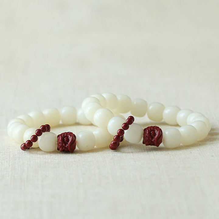 Buddha Stones Naturalne Nasiona Bodhi Cynober Tańczący Lew Charm Mądrość Harmonia Nadgarstek Mala