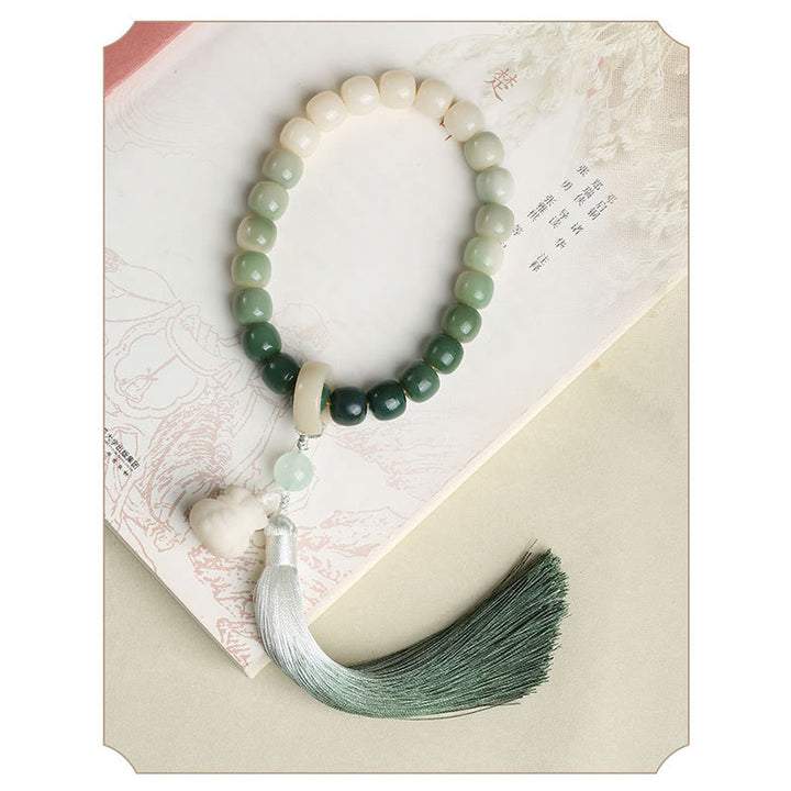 Buddha Stones Naturalny Gradient Bodhi Nasiona Fortuny Pieniądze Worek Lotos Mądrość Tassel Nadgarstek Mala