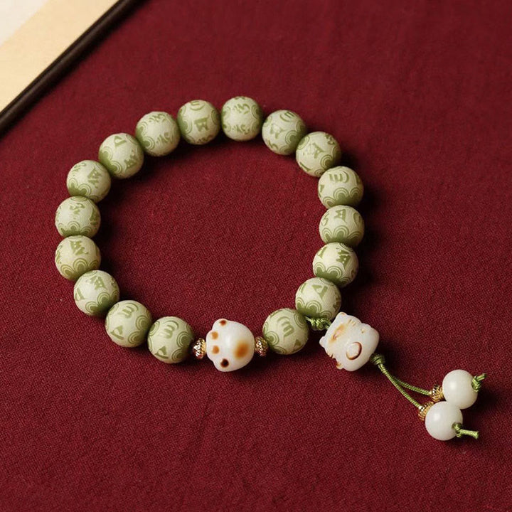 Buddha Stones Zielone Nasiona Bodhi Łapa Kota Om Mani Padme Hum Grawerowana Bransoletka Mądrości - image 2