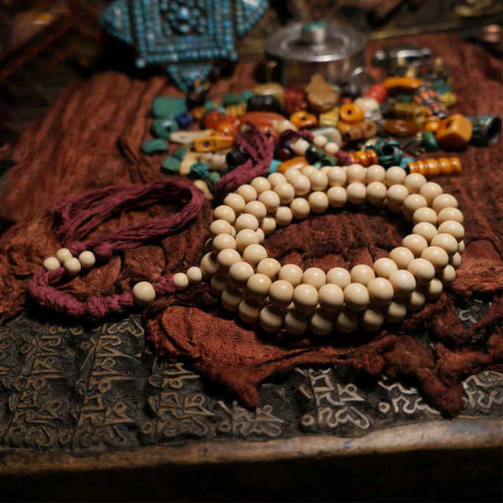 Buddha Stones 108 Mala Koraliki Abelia Biflora Drewno Odpędzające Złe Duchy Mala Nadgarstek