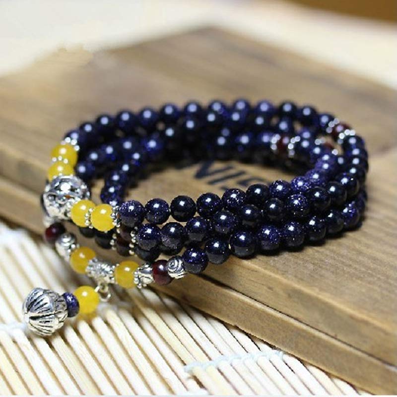 Bransoletka z zawieszkami bogactwa z niebieskiego piaskowca i Buddha Stones Mala
