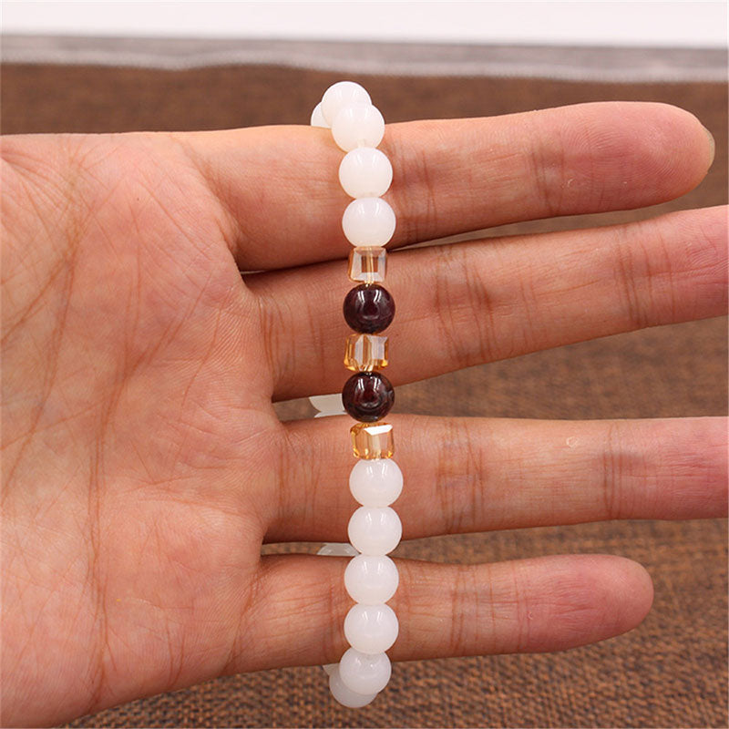 Bransoletka ochronna z naturalnego białego jadeitu z Buddha Stones
