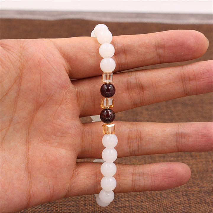 Bransoletka ochronna z naturalnego białego jadeitu z Buddha Stones - image 3