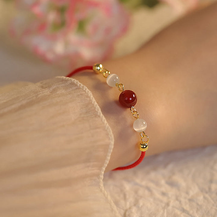 Buddha Stones Red Agat Cat Eye Braided String Confidence - Czerwony agat i czerwony sznurek (rozmiar bransoletki 15+5 cm) - image 1