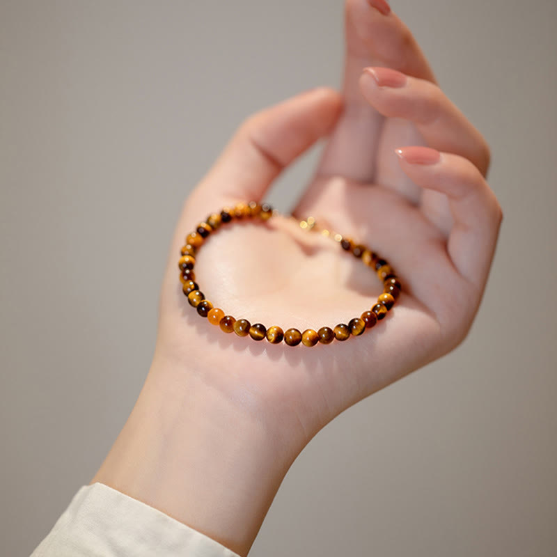 Bransoletka ochronna z Buddha Stones 14K pozłacane naturalne tygrysie oko z kamieniami odwagi