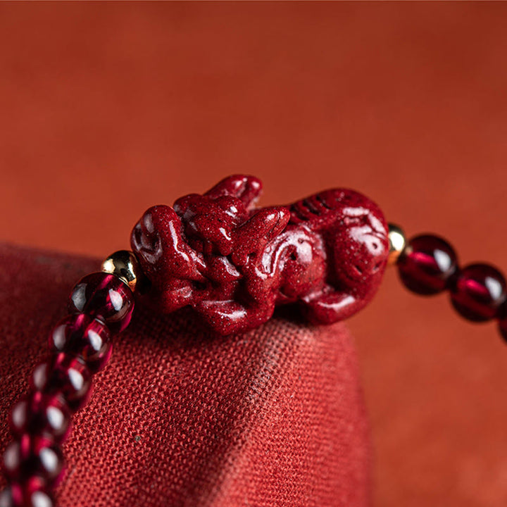 Bransoletka z sznurka z Buddha Stones Granat Cynober PiXiu Błogosławieństwo Spokój