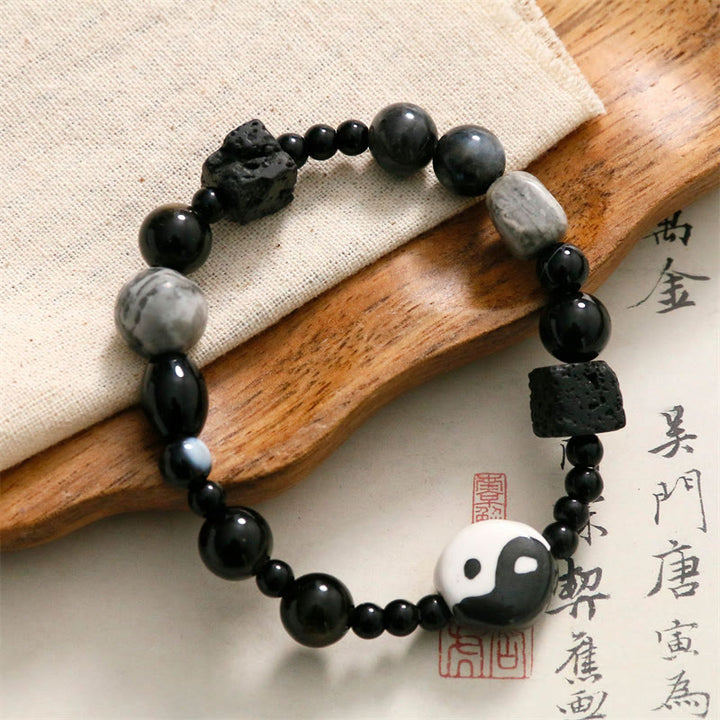 Bransoletka ochronna z Buddha Stones z czarnego onyksu i koralikami z jaspisu Picasso Yin Yang