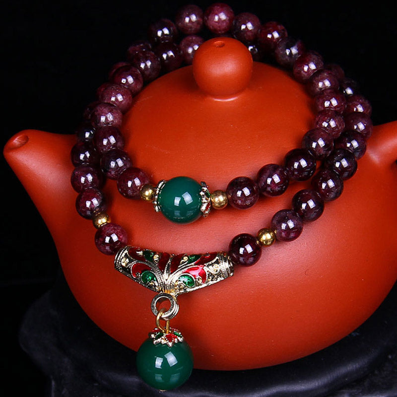 Bransoletka z naturalnego granatu i Buddha Stones