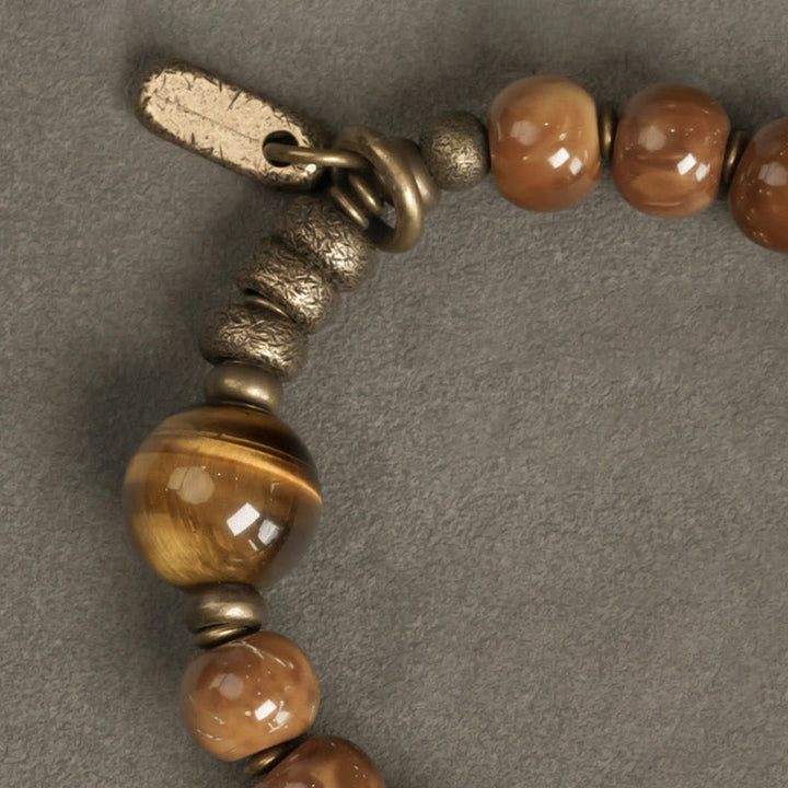 Bransoletka z Buddha Stones , nasiona Kuka, tygrysie oko, złoty połysk obsydianu, mosiądzu i miedzi, zapewniająca bogactwo i szczęście - image 11