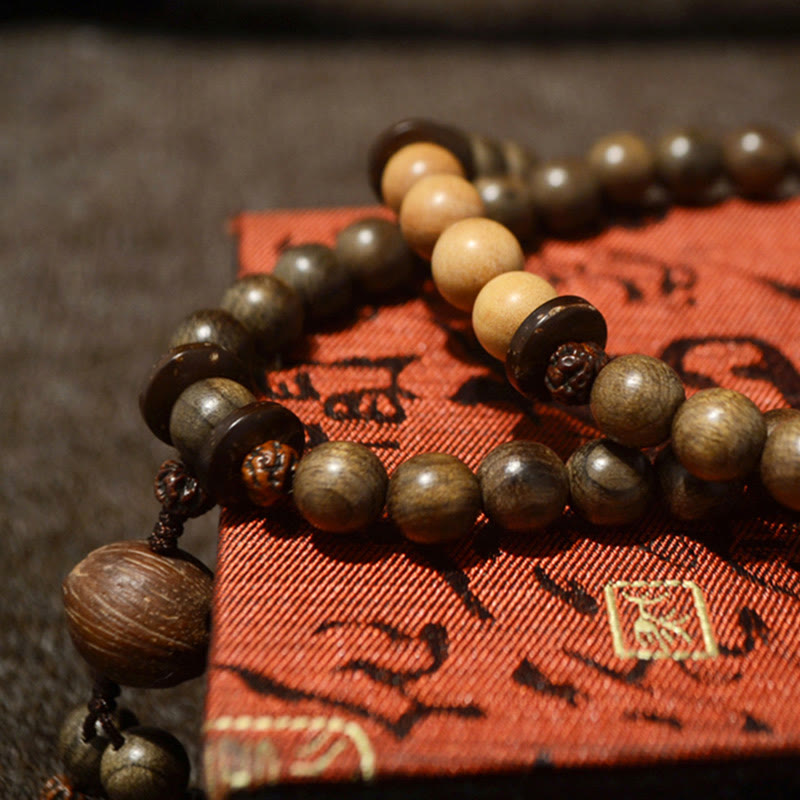 Bransoletka Mala z Buddha Stones z sandałowca tybetańskiego