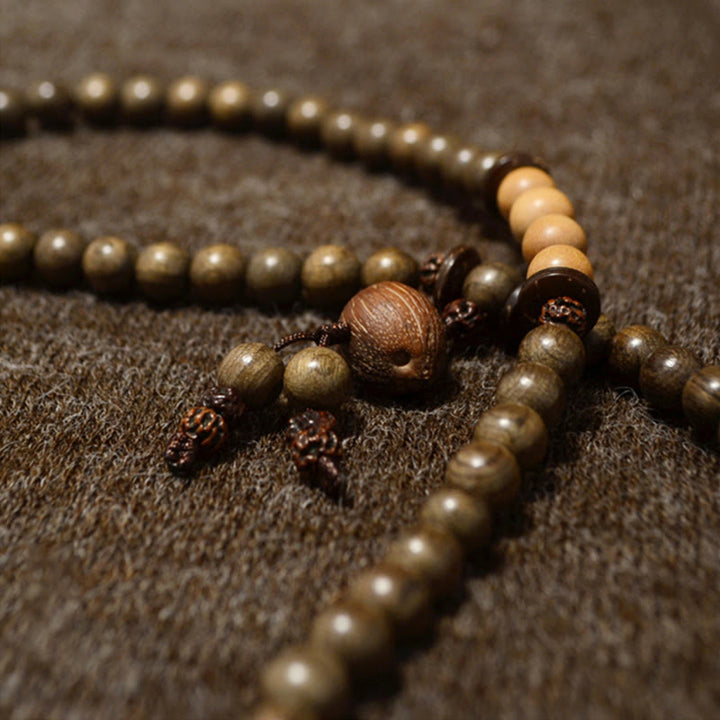Bransoletka Mala z Buddha Stones z sandałowca tybetańskiego - image 9