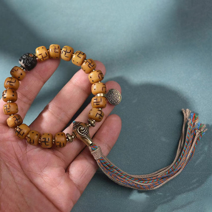 Buddha Stones naturalne tybetańskie kości wielbłąda swastyka Dzi koralik Shankha wisiorek buddy Kirtimukha ochrona szczęścia bransoletka z frędzlami