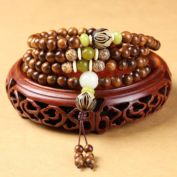 Bransoletka ochronna Mala z palisandru tybetańskiego z Buddha Stones