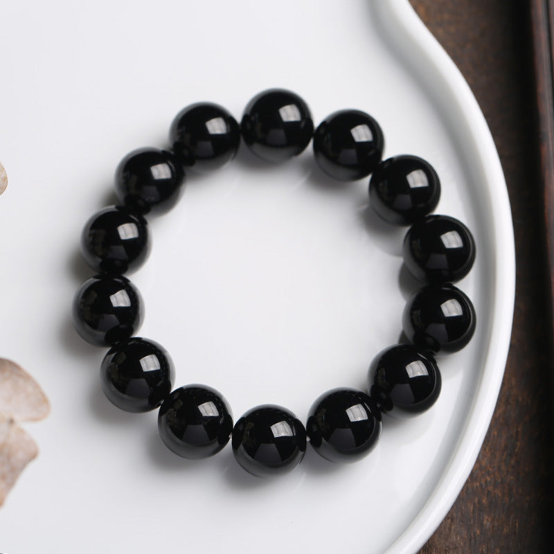 Bransoletka z naturalnego czarnego onyksu z Buddha Stones