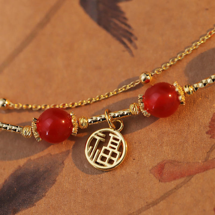 Bransoletka z motywem samoakceptacji z czerwonego agatu i Buddha Stones Fu