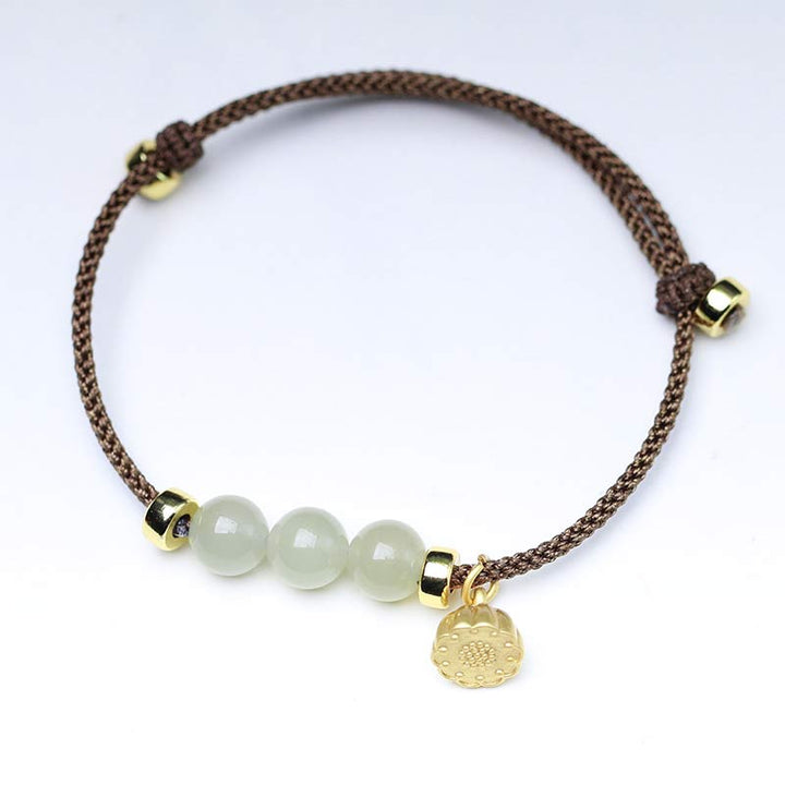 Bransoletka z naturalnego jadeitu i nasion lotosu z czerwonej nici Buddha Stones