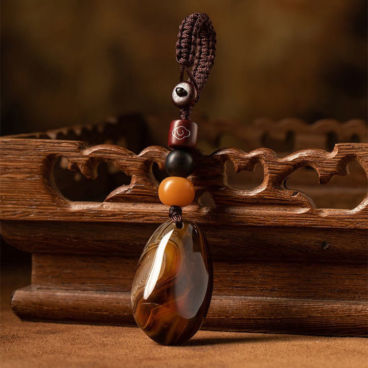 Buddha Stones Losowy Kamień Sardonyx Pozytywny Brelok